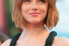 a short ginger textural bob with a curtain fringe is a stylish idea that feels like the 70s