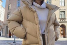 a simple and lovely winter combo – a white sweater, tan leather pants, a tan cropped puffer jacket