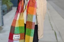 a white sweatshirt, a tan leather blazer, black jeans and white trainers, a super colorful plaid scarf are great for summer