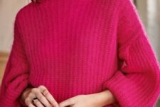 02 a beautiful chunky knit fuchsia sweater, neutral plaid trousers and statement earrings plus statement rings