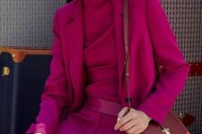 11 a full magenta look with a turtleneck, pants, an oversized blazer, a striped bag is a bold and cool idea for work