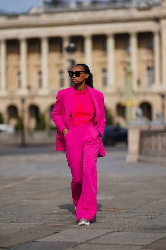 a magenta pantsuit, a red top, neutral trainers are a fantastic and super bold look for spring