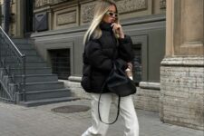 15 a comfy winter outfit with white jeans, a black puffer, black trainers and a black backpack is a cozy idea
