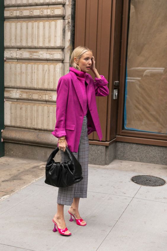 a magenta sweater and blazer, grey plaid cropped pants, pink shoes and a black bag for a super bold work look