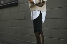 29 a white oversized shirt, a neutral sweater on top, black skinnies, burgundy croco leather boots and a taupe bag