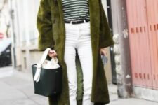 30 a winter look with a green striped top, white jeans, blue boots, a green faux fur coat and a black bag
