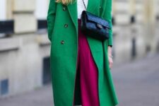 31 a white t-shirt, magenta pants, black boots, a green coat and a black bag are a bold combo that is comfy in wearing