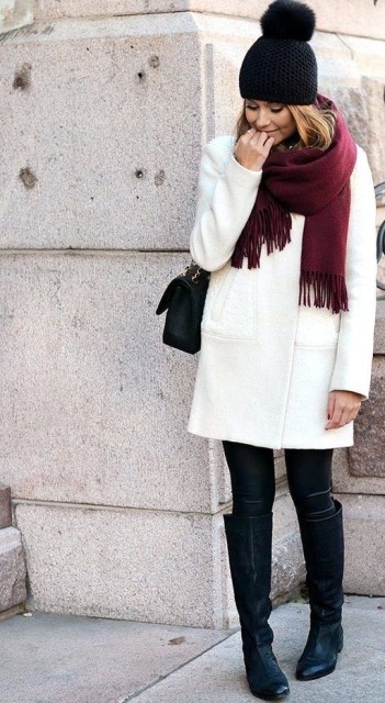 With black skinny pants, black leather chain strap bag, marsala fringe scarf and black leather high boots