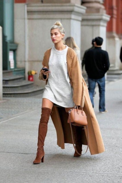 With brown leather bag and light brown maxi coat