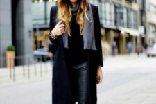With gray scarf, black leather skinny pants, black leather ankle boots and black sweater