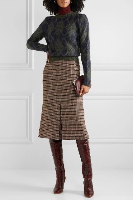 With marsala turtleneck, brown leather clutch and brown patent leather high boots