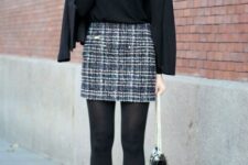 With sunglasses, black blazer, black tights, black leather chain strap bag and black patent leather pumps