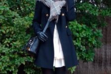 With white ruffled mini dress, black tights, black embellished ankle boots, black leather bag, checked scarf and black leather gloves