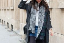 With white sweater, blue denim mini skirt, black tights, black patent leather lace up flat shoes, black and white checked scarf and black bag