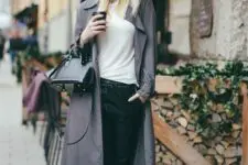 With white t-shirt, black leather trousers, white lace up flat shoes and black leather bag