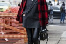 a gorgeous work outfit with black leather trousers, a white shirt, a black oversized blazer, red shoes and a red plaid coat