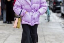 a refined winter look with a color block turtleneck, a black skirt and lace up boots, a lilac belted puffer jacket