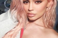 Kylie Jenner wearing strawberry blonde on long hair with texture looks super cute and lovely