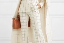 With beige checked midi coat, brown leather bag and marsala velvet pumps