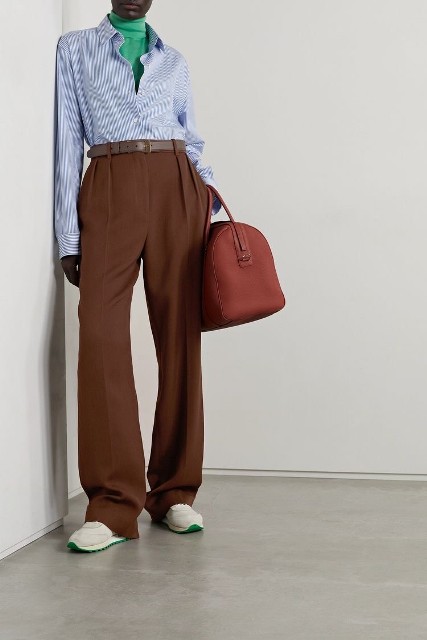 With blue and white striped button down shirt, marsala bag and white and green sneakers