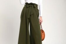 With brown rounded chain strap bag and brown leather ankle strap high heeled shoes