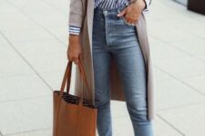With light blue skinny jeans, brown leather flat shoes and brown leather tote bag