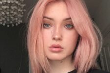 a beautiful warm pastel strawberry blonde with a darker root and much texture looks awesome