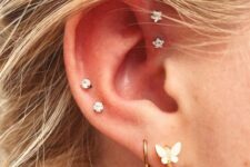 beautiful ear styling with a double lobe, double high low or low helix and double forward helix piercing