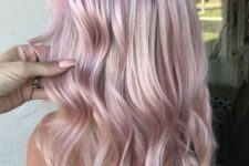 beautiful long wavy hair in a pale shade of pink is a lovely idea if you wanna look girlish