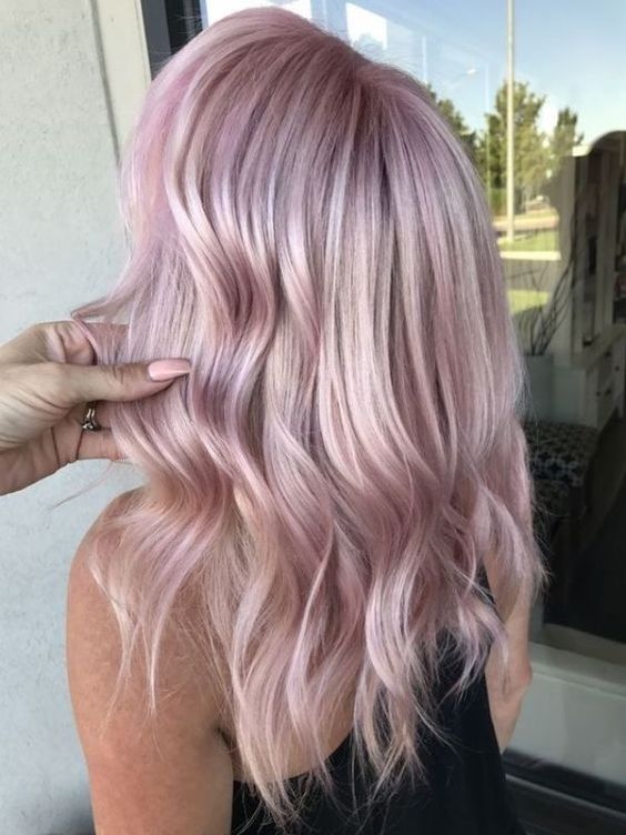 beautiful long wavy hair in a pale shade of pink is a lovely idea if you wanna look girlish