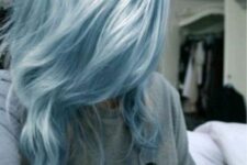 fabulous long pastel blue hair with waves and much volume will make a statement in your look