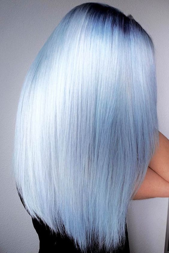 fantastic silver and pastel blue hair with a gradient effect and a darker root looks like liquid