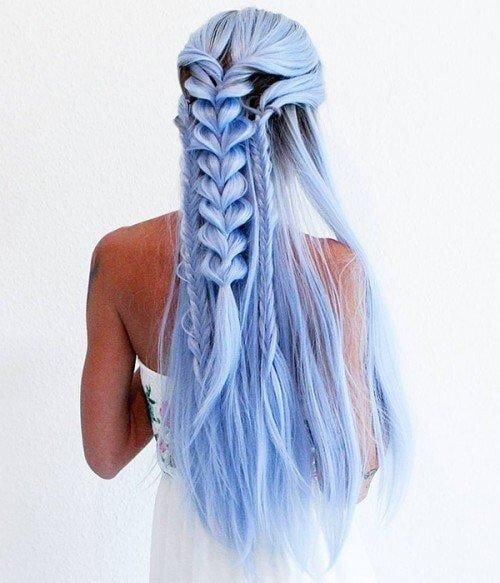 long and textural pastel blue hair with several braids down is an incredibly beautiful idea to go for
