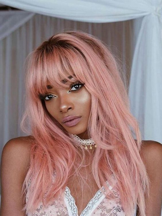long pastel pink hair with much texture, with bangs and layers is a very beautiful and candy like idea