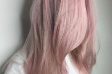 long wavy hair with a delicate pale pink shade and some layers is a lovely idea for any girl who loves pastels