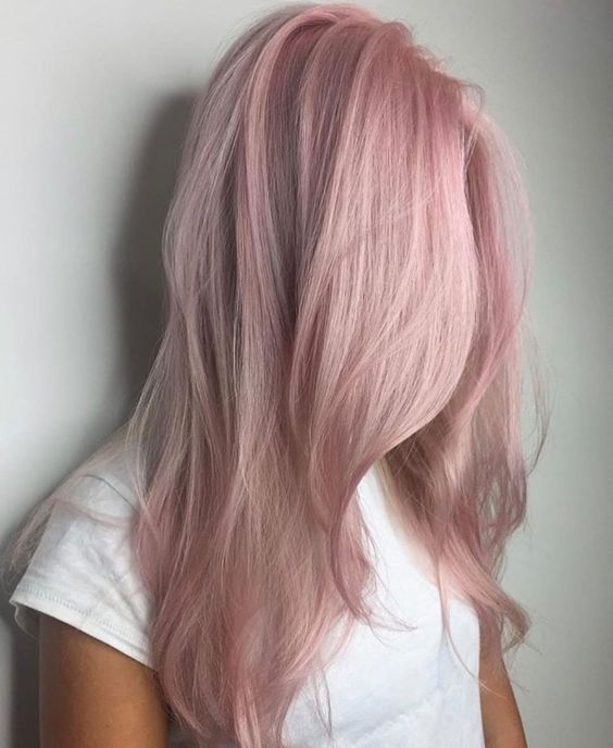 long wavy hair with a delicate pale pink shade and some layers is a lovely idea for any girl who loves pastels
