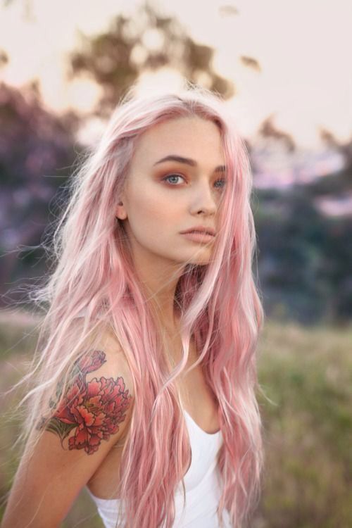 long wavy pastel pink hair with much texture and a pink smokey eye to finish off the look