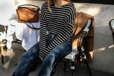 02 a black Breton stripe top, navy jeans, white trainers and a brown bag for a warm spring day