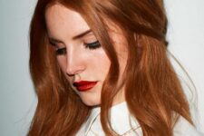 03 Lana Del Rey wearing fantastic copper red locks with central parting and a touch of shine looks wow