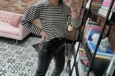 06 a Breton stripe top, black leather pants, black sneakers are a cool look that is basic but bold