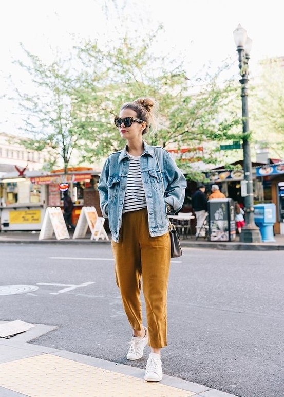a Breton stripe top, mustard pants, white sneakers, a light blue denim jacket are a great look for spring