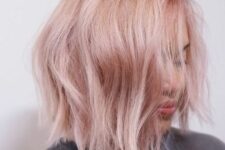 11 a pastel pink long bob with textural waves and side parting is a modern and chic idea for rocking right now