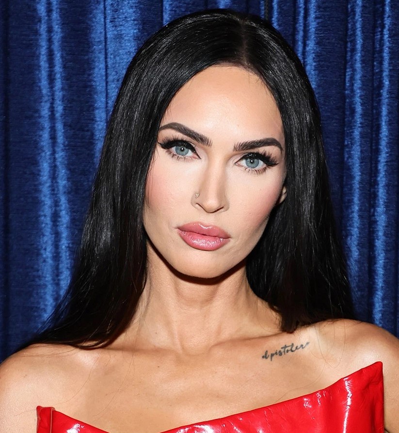 Megan Fox wearing perfect glossy brunette hair with side parting looks jaw dropping