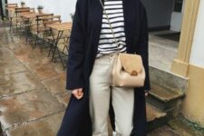 14 a Breton stripe top, neutral jeans, white sneakers, a navy trench and a tan bag are amazing for spring
