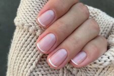 15 a classy French manicure with nude nails and small white tips is a more modern version of this manicure