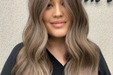 24 a soft mushroom brown shade with waves and lighter lowlights is a beautiful and delicate solution