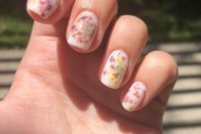 24 milky nails with colorful dried flowers are a gorgeous idea for a spring or summer look, they can be rocked at a wedding, too