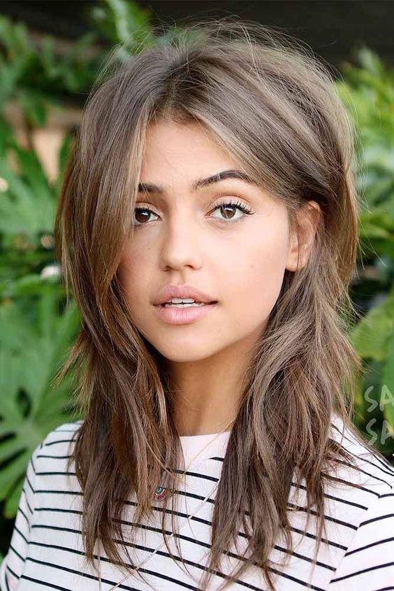 soft mushroom brown hair with a wolf cut is a gorgeous idea to rock this year, two trends in one