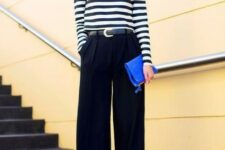 26 a stylish work look with a striped long sleeve top, black palazzo pants, electric blue shoes and a clutch