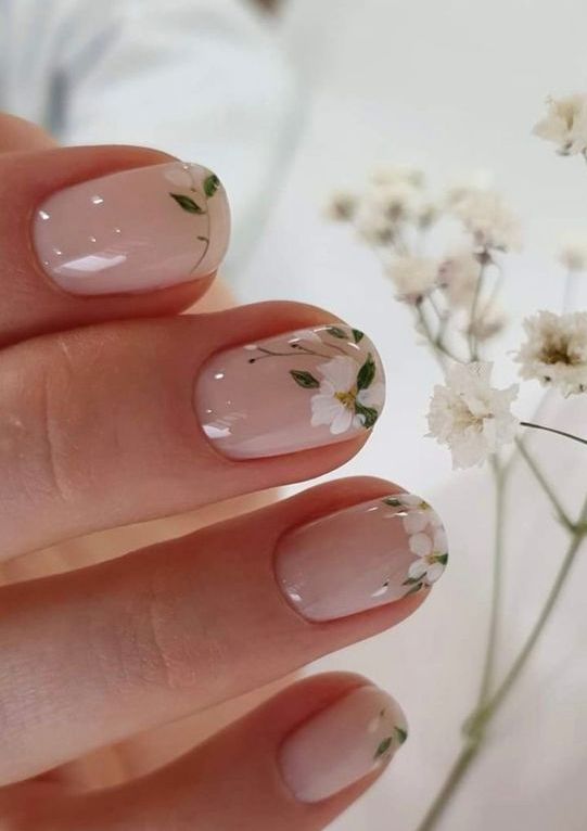 nude nails with a bit of white blooms painted on them will be a gorgeous solution for spring and summer